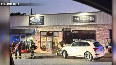 Crash sends vehicle into building in Chelmsford